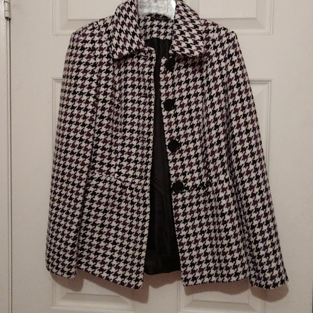 White jacket with black and purple designs